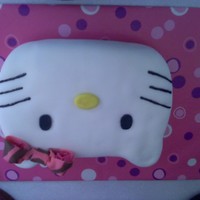 Hello Kitty! Hello Kitty cake for my friend Ciara! Very very easy to make. Simply used a 13x9 pan and took and knife and shaped the ears. Covered in...