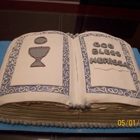 First Communion Cake First Communion book cake for a little girl, white cake on one side the other one is yellow cake. Covered in butter cream with strawberry...
