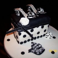 Chic Black & White Cake "A covered fondant cake, with gumpaste shoes. Didn't like that rose with the black stripes, I dont know where my mind was!!!:LOL...