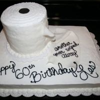 Img_4194.jpg Toilet paper roll made of three 6" rounds. BC icing and wrapped in fontant that had impressions made with flower cutter and...