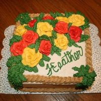 Fall Roses A huge boquet of roses in fall colors for a November birthday. Made from 2 layers of 8" square allowed lots of space for LOTS of icing...