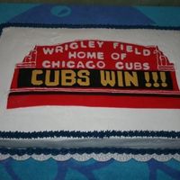 Wrigley Field Marque Birthday cake for a Chicago Cubs fan! White cake with BC icing. Fondant used for the replica of the marque. Had a little trouble with the...