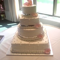 Round And Square W/pink Calla Lilly Flowers The bride used silver and pink in her wedding colors. She wanted something simple to reflect her simple style. The ribbon is real and the...