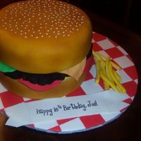 Burger And Fries My first burger cake. Board was pieces of fondant as well as the fries.