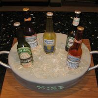 Another Beer Bottle Cake For my son's friend's 21st. All fondant and sugar beer bottles.