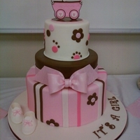 Pink/brown Shower Cake Did this few months ago for a co-workers baby shower. Fondant covered IMBC with gp decors.