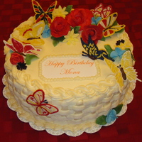 Butterflies And Flowers This is a strawberry cake, flowers are gumpaste/fondant mix and butterflies are candy melts.