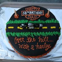 Harley Cake For My Dad This was my first cake. A simple yellow cake with a chocolate buttercream icing.