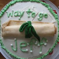 High School Graduation This is my first-ever decorated cake. I made it for my brother's high school graduation.The diploma and the roses at the bottom are...