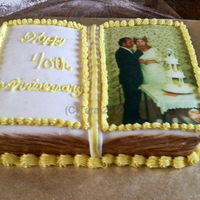 40Th Wedding Anniversary Cake Vanilla cake,Vanilla buttercream for the crumb coat,covered in fodant,Fondant & buttercream decorations.Customer wanted it very simple...