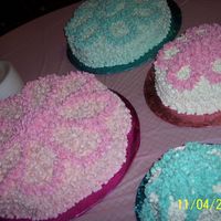Flower Cakes For Small Bridal Shower These cakes I used different sizes of the flower shaped pan. I used buttercream frosting with almond and vanilla flavorings. I used a large...
