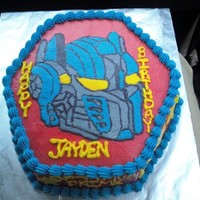 Transformers Cake Covered in Crusting Buttercream, and filled with it also. SOO much fun to draw and fill in!!