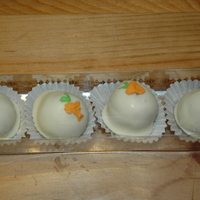 Carrot Cake Balls Carrot cake, cream cheese icing, white chocolate, royal icng decorations