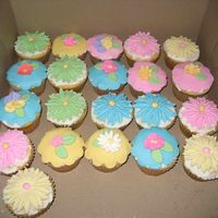 Cupcakes Galore I decided to make cupcakes on a free afternoon. Vanilla flavored with buttercream and most tops are fondant and some of the flowers are...