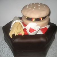 Burger Cake I made a cake with the recipe of a Heinz Ketchup Cake with creamcheese as the icing. All covered in fondant. the burger bun, pattie, french...