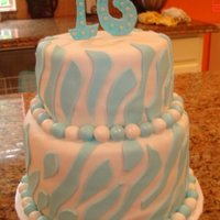 Blue Zebra Stripe This is for a Sweet 16 birthday party. She wanted blue zebra stripes. Fondant accents and gumpaste topper.