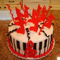 Music Explosion This cake was made for a music-loving birthday girl. Chocolate cream cake. All fondant accents.