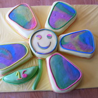 Flower Power Sweet 16 Birthday This is the birthday cake I made for my Nieces Sweet 16. The cake is tye dye with yellow, green, blue, pink, purple and orange cake (...