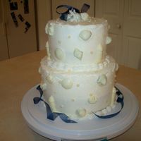 Beach/bridal Shower Cake - 2009-04-25 Bottom Tier is White Cake; Top Tier is Chocolate & White Marble. BC Filling & Icing. Accents: Molded white chocolate lighthouse&...