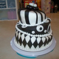 Wonky/topsy-Turvy/mad Hatter Cake - 2009-02-08 I saw this cake on this site and couldn't resist! I just HAD to try my hand at it!This was for my so's 16th Birthday Party....
