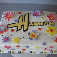 Hannah's 6Th White cake with raspberry creme filling, fondant decorations