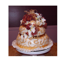 Fall Wedding Cake The cake is a traditional Tridadian Fruit cake.... very heavy! The flowers are silk.