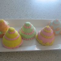 Mini Three Tier Cakes Homeade vanilla cake with strawberry filling.