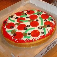 Carrianne's Pretty Pizza Baked a boxed yellow cake mix in 12" pan. Sauce is red buttercream. Pepperoni and veggies are all homemade fondant and cheese is white...