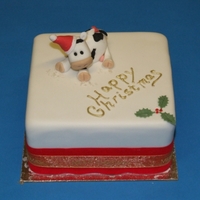 Cow Christmas Cake Mini-fruit cake covered in fondant with cow wearing santa hat, made from sugar paste
