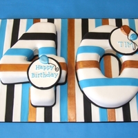Striped 40Th Birthday Cake Fondant covered forty cake covered with stripes, some of which are painted with lustre-dust.Pastillage plaques and run-out royal iced...
