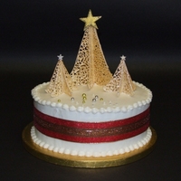 Christmas Cake With Royal Icing Royal-Iced fruit cake with trees from royal icing and fondant stars