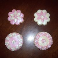 Prettycookies.jpg These are NFSC covered in White Chocolate Modeling clay then dusted with Luster dust!