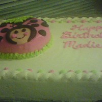 Ladybug Cake I baked this cake for my granddaughter's fifth birthday. It's a 12 x 18-inch sheet with a 6-inch round "ladybug" on top...