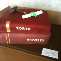 Law School Graduation Cake stack of books topped by fondant gavel and diploma