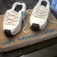 Pair Of Shoes On Hardwood Floor This was a birthday cake for my nephew - my first effort at a shoe cake! But the floor turned out great! Dark Chocolate Sour Cream cake...