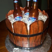 Bucket Of Cold Beer Cake this is the first time I have made this cake... I'm very happy with the way it came out... I got a call from the person this cake was...