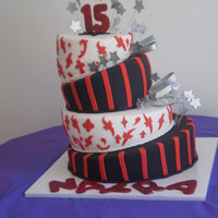 Black, White N Red Topsy Turvy My 1rst Topsy, 3 flavor almond, choco and marble cake, all details in gumpaste. I'm very proud...