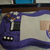 Hannah Montana Guitar Cake This is just not the finished version...I fixed what I could to make the arm appear like part of the cake. You can see that I have never...