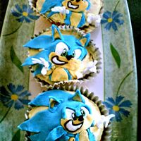Sonic The Hedgehog Cupcakes Sonic the Hedgehog Cupcakes - My first attempt at trying to make a swish kids cupcake using fondant & vanilla buttercream frosting.
