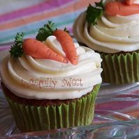 Carrot Cupcakes Carrots are fondant with parsley :)