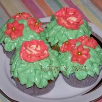 Flower Cupcakes These were carrot cake cupcakes with classic cream cheese frosting (tinted green) and BC flowers.