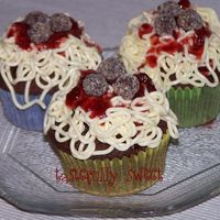 Spaghetti Cupcakes Chocolate cupcakes with vanilla IMBC spaghetti, strawberry sause and chocolate truffle meatballs.