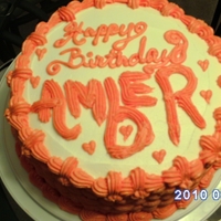 My Friends 23Rd Birthday This is a 2 Layer Rainbow Cake from scratch with 6 different colors inside covered with Lemon Pink Butter Cream in a Basket Weave