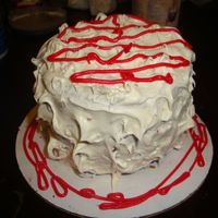 Mini Red Velvet Cake this is a mini red velvet and pecan cake with cream cheese frosting topped with red icing