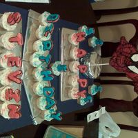 Spiderman And Cupcakes this one a made for my son's 5th birthday at school the spiderman is all chocolate the letters are butter cookies on cupcakes