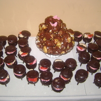 Chocolate Pots Choux pastry filled with caramal, banana & fresh cream, topped with ganache. Chocolate pots with lids. Filled with strawberry mousse &...