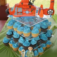 Hh-65 Coast Guard Helicopter Helicopter was completely edible. All fondant decor except blades which were gum paste, center was cake with nose and tail being RKT. My...