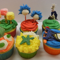 Dr Seuss Cupcakes assorted dr seuss cupcakes for his recent birthday. Made with candy melts, marshmallows (truffula trees), cake bite (green ham) and dum dum...