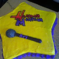 Hannah Montana Star Niece wanted Hannah Montana. Plain star pan. Vanilla cake, buttercream icing. Free-styled name/logo and microphone.