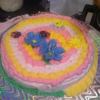 Flowers And Ladybugs Another shot of my niece's 1st cake. She's 12 years old and we decided to play around during a weekend visit. I think she did a...